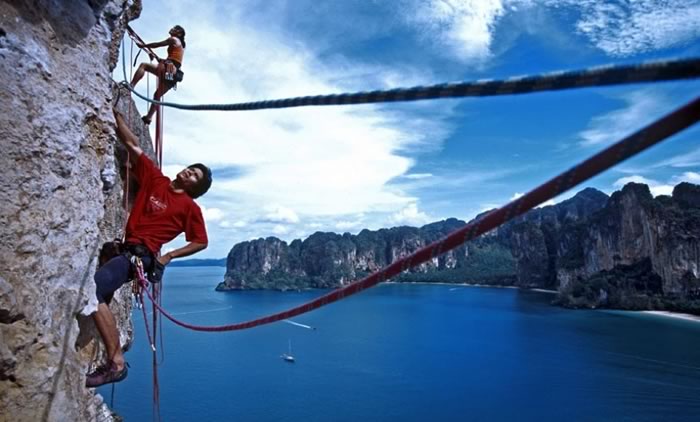 Climbing over Railay Beach